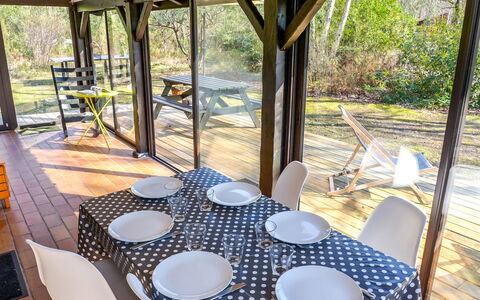 Marina de Talaris: Table, Plant, Property, Furniture, Tableware, Chair, Dishware, Building, Outdoor Table, Wood