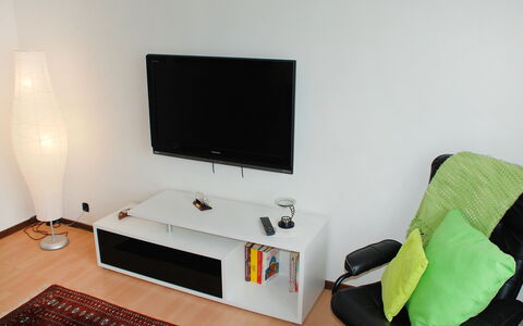 Gemma: Room, Furniture, Property, Technology, Interior Design, Flat Panel Display, Table, Computer Desk, Electronic Device, Television