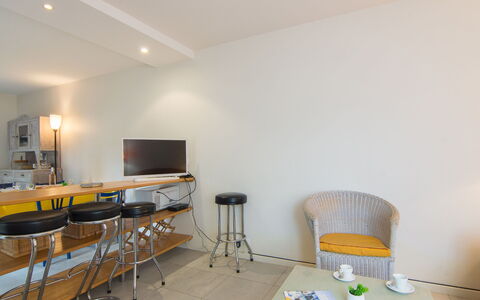 Petit Acacia: Furniture, Table, Building, Television, Wood, Interior Design, Floor, Flooring, Chair, Hardwood
