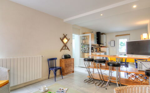 Petit Acacia: Table, Furniture, Property, Television, Picture Frame, Chair, Couch, Wood, Flooring, Interior Design