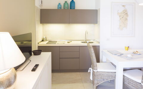 Golfo Aranci Ortensia Apartments: Room, Property, Furniture, Interior Design, Bathroom, Floor, Tile, Sink, Building, House