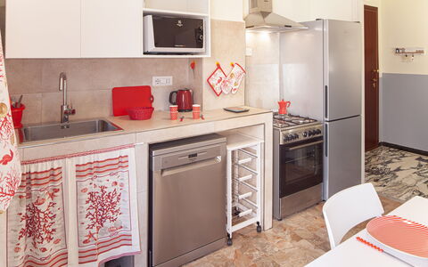Giulia Apartment - Levanto: Cabinetry, Countertop, Property, Furniture, Kitchen Appliance, Kitchen Stove, Sink, Kitchen, Home Appliance, Wood