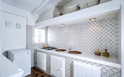 Bianca: Flooring, Interior Design, Kitchen, Floor, Countertop, Ceiling, Tile, Plumbing Fixture, Room, Tap