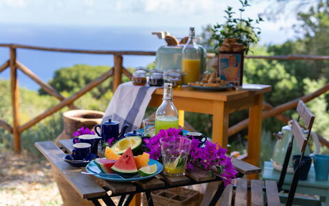 Terre Di Bea Cottage By The Sea Cefalu': Table, Vacation, Flower, Meal, Resort, Furniture, Restaurant, Balcony, Backyard, Breakfast