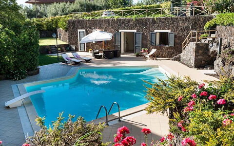 Eden Retreat: Water, Flower, Plant, Property, Swimming Pool, Azure, Building, Tree, Chair, Outdoor Furniture