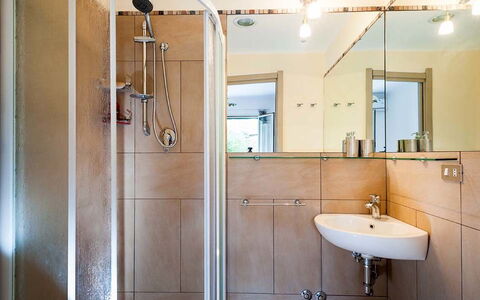 Eden Retreat: Mirror, Plumbing Fixture, Tap, Sink, Property, Shower Head, Building, Bathroom Sink, Shower Door, Bathroom