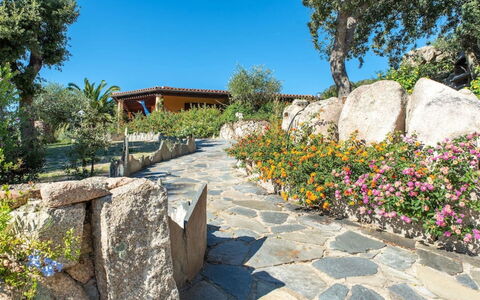 Residence Villa Smeralda: Plant, Sky, Property, Plant Community, Flower, Building, Tree, Natural Landscape, Bedrock, Road Surface