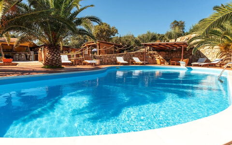 Residence Villa Smeralda: Water, Sky, Property, Swimming Pool, Nature, Azure, Tree, Lighting, Body Of Water, Plant