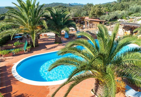 Residence Villa Smeralda: Water, Plant, Property, Tree, Sky, Azure, Swimming Pool, Arecales, Vegetation, Leisure