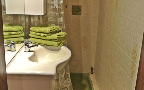 Rustika: Bathroom, Green, Property, Room, Toilet, Tile, Toilet Seat, Plumbing Fixture, Interior Design, Floor