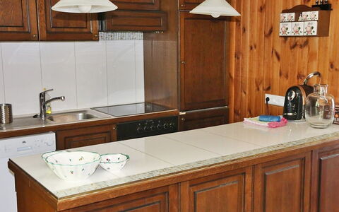 Rustika: Countertop, Kitchen, Cabinetry, Room, Furniture, Property, Sink, House, Wood Stain, Building