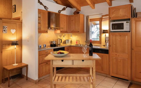 Ropiar: Furniture, Kitchen, Cabinetry, Interior Design, Wood, Countertop, Flooring, Kitchen Appliance, Ceiling, Floor