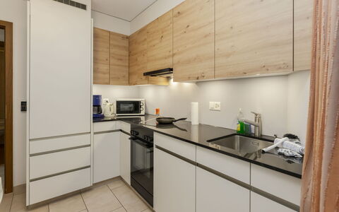 Rehli: Kitchen, Countertop, Kitchen Appliance, Cabinetry, Interior Design, Furniture, Flooring, Wood, Major Appliance, Floor