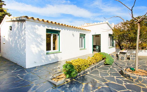 Mimosa: House, Property, Home, Building, Real Estate, Blue, Residential Area, Yellow, Sky, Facade