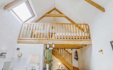 La Belle Océane: Room, Property, Ceiling, Furniture, Yellow, Interior Design, Stairs, Home, Bed, House