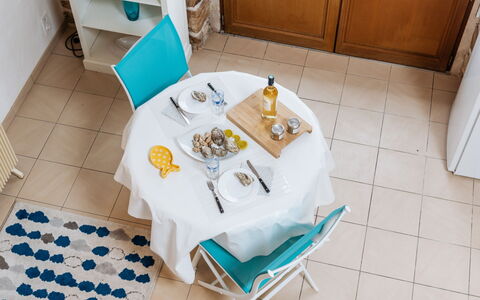 La Belle Océane: Property, Furniture, Cabinetry, Blue, Table, Interior Design, Floor, Flooring, Chair, Wood