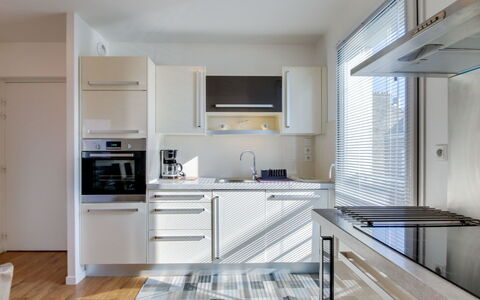 Clos Schuman: Cabinetry, Countertop, Building, Kitchen Stove, Kitchen, Kitchen Appliance, Wood, Home Appliance, Flooring, Floor