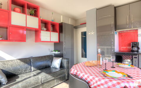 Dinard 220: Furniture, Table, Property, Cabinetry, Building, Interior Design, Lighting, Orange, Flooring, Living Room