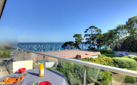 Dinard 220: Sky, Plant, Table, Building, Tableware, Water, Azure, Shade, Chair, Outdoor Furniture