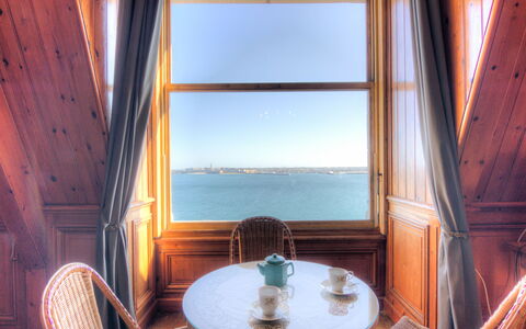 La Garde: Table, Furniture, Property, Sky, Chair, Water, Building, Azure, Plant, Window