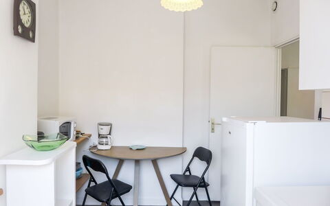 St Jean: Table, Furniture, Chair, Building, Interior Design, Wood, Clock, Flooring, Wall, Floor