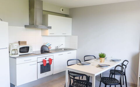 Amigorena: Furniture, Cabinetry, Property, Building, Countertop, Wood, Kitchen Stove, Table, Interior Design, Kitchen Appliance