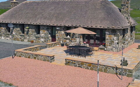 Glenn Cottage: Property, Building, Sky, Plant, Leisure, Shade, Landscape, Landmark, Urban Design, Facade