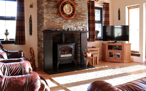 Glenn Cottage: Brown, Property, Furniture, Window, Wood, Living Room, Hearth, Picture Frame, Comfort, Flooring