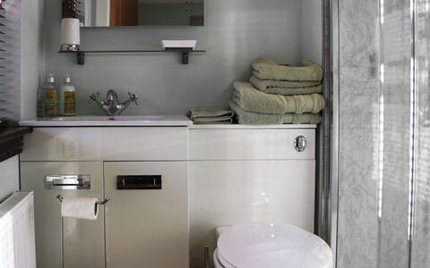 Glenn Cottage: Plumbing Fixture, Property, Sink, Mirror, Tap, Cabinetry, Toilet Seat, Bathroom, Lighting, Purple