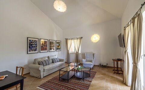 Gardenia: Furniture, Interior Design, Flooring, Floor, Wall, Couch, Ceiling, Room, Lighting, Living Room
