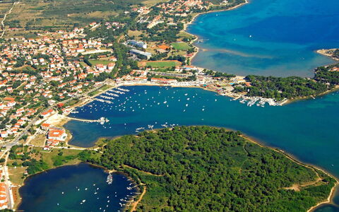 Sea: Water, Sky, Plant, Building, Azure, Natural Landscape, Tree, Body Of Water, Beach, Terrain