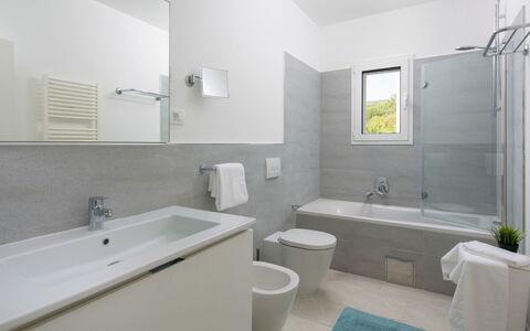Chiara: Bathroom, Property, Room, Interior Design, Bathtub, Plumbing Fixture, Floor, Wall, Building, Architecture