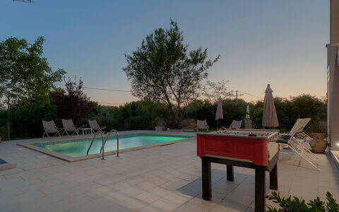 Chiara: Sky, Plant, Shade, Table, Swimming Pool, Outdoor Furniture, Tree, Residential Area, Leisure, Public Space