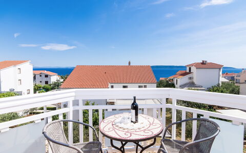 Trogir Okrug Gornji 314: Sky, Table, Building, Property, Cloud, Chair, Outdoor Furniture, Outdoor Table, Interior Design, Wood