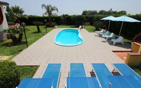 Andrea: Plant, Water, Building, Azure, Swimming Pool, Tree, Sky, Outdoor Furniture, Shade, Leisure