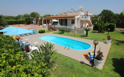 Andrea: Water, Plant, Sky, Swimming Pool, Building, Azure, Tree, Shade, House, Outdoor Furniture
