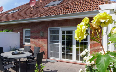 Adda: Plant, Building, Table, Property, Window, Furniture, Flower, Sky, Chair, House