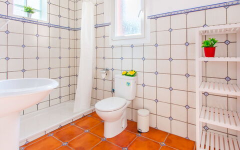 Requesens: Bathroom, Tile, Property, Room, Floor, Interior Design, Toilet, Wall, Architecture, Plumbing Fixture