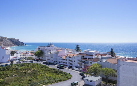 Praia da Luz Sea View: Property, Sky, Town, Sea, Coast, Building, City, Vacation, Real Estate, Summer