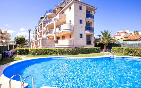 Jacaranda: Water, Building, Plant, Sky, Daytime, Property, Swimming Pool, Azure, Window, Tree