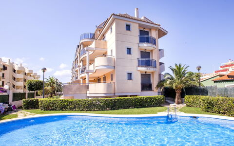 Jacaranda: Water, Building, Plant, Sky, Daytime, Property, Swimming Pool, Azure, Window, Tree