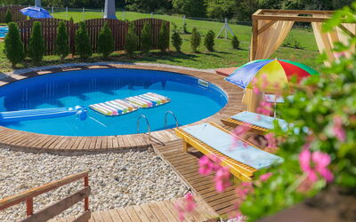 Tinjan 400: Plant, Water, Swimming Pool, Tree, Outdoor Furniture, Shade, Rectangle, Leisure, Grass, Landscape