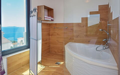 Andrea: Bathroom, Property, Room, Bathtub, Floor, Wall, Tile, Interior Design, Architecture, Plumbing Fixture