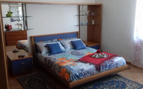 Corallo: Bedroom, Bed, Bed Sheet, Furniture, Room, Bedding, Property, Bed Frame, Mattress, Interior Design