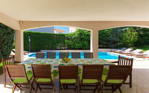 Carmen: Plant, Furniture, Table, Building, Chair, Porch, Shade, Outdoor Furniture, Interior Design, Living Room
