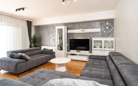 Jure: Furniture, Interior Design, Flooring, Floor, Couch, Wood, Living Room, Ceiling, Room, Table