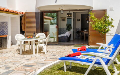 Studio Loureiro: Table, Furniture, Plant, Building, Chair, Outdoor Table, Shade, Outdoor Furniture, House, Houseplant