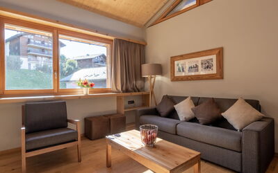 Swisspeak Resorts Vercorin 9000.123: Interior Design, Wood, Furniture, Ceiling, Flooring, Floor, Room, Living Room, Couch, Apartment