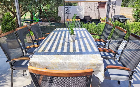 Ive: Plant, Furniture, Table, Outdoor Table, Chair, Outdoor Furniture, Wood, Tree, Building, Grass