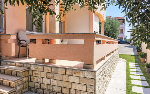 Ive: Property, Plant, Orange, Road Surface, Architecture, Brick, Urban Design, Brickwork, Wood, Rectangle